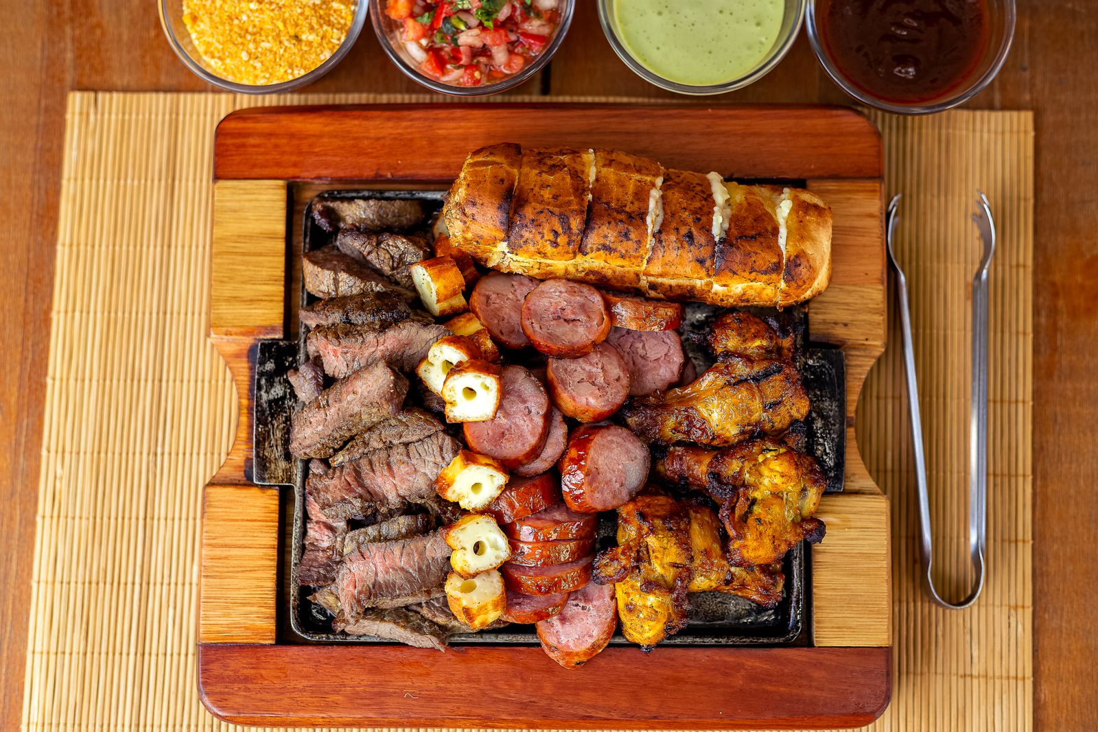 A grilled sausage and meat board at Emil's